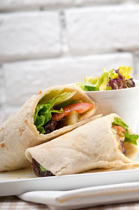 Kafta shawarma chicken pita wrap roll sandwich traditional arab mid east food