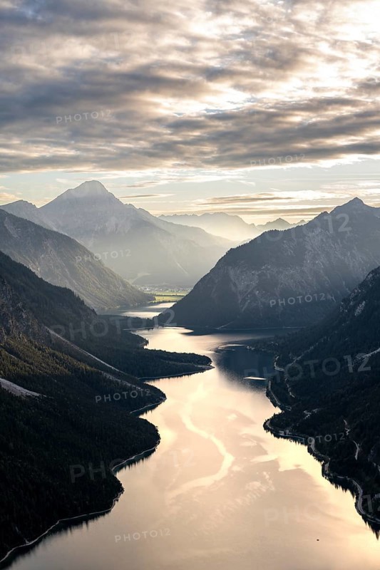 View of the Plansee lake from Schoenjoechl at sunset