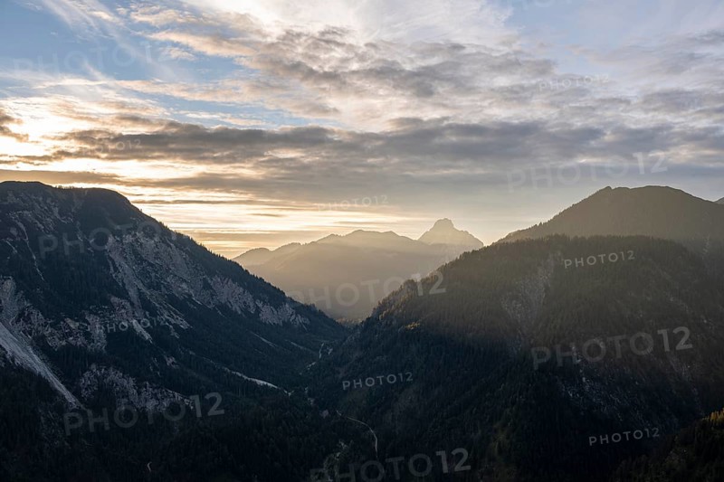 View of mountains and Ammerwald valley with summit Ammergauer Hochplatte
