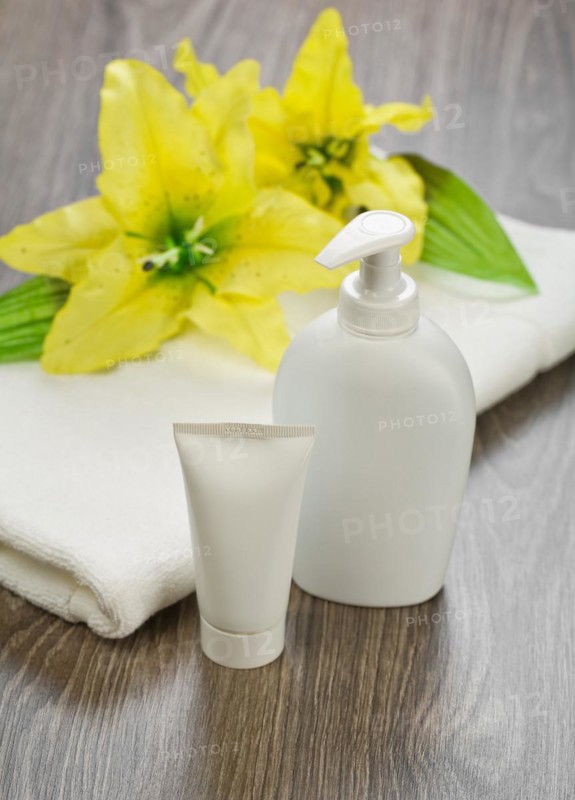 Towel tube bottle and flower