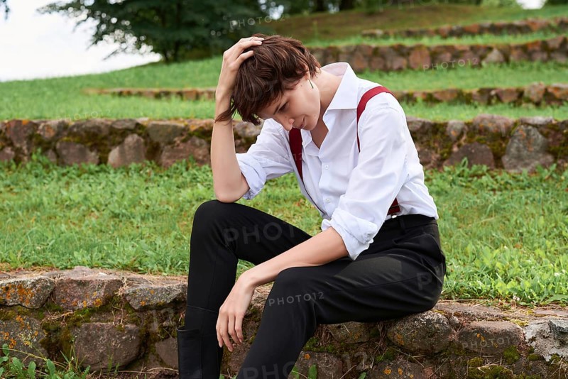 Image of a stylish beautiful woman in a white shirt