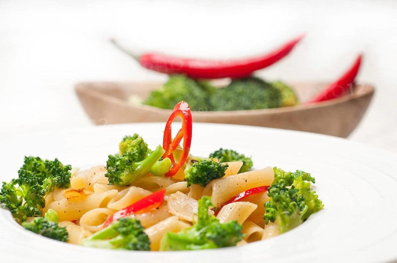 Classic Italian penne pasta with broccoli and red chili pepper