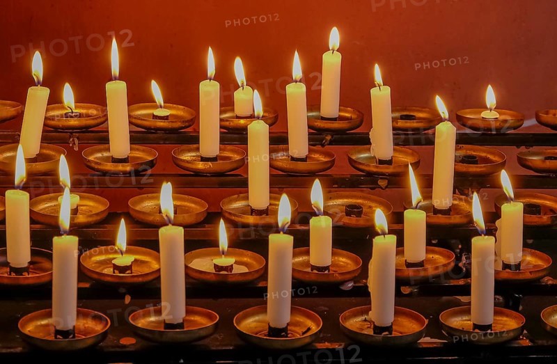 Sacrificial candles in a church