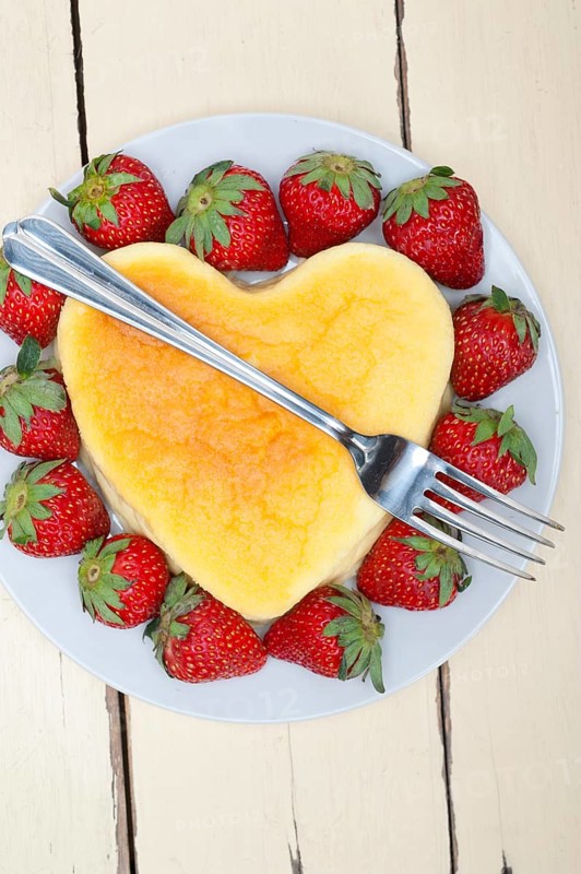 Heart shaped cheesecake with strawberryes ideal cake for valentine day