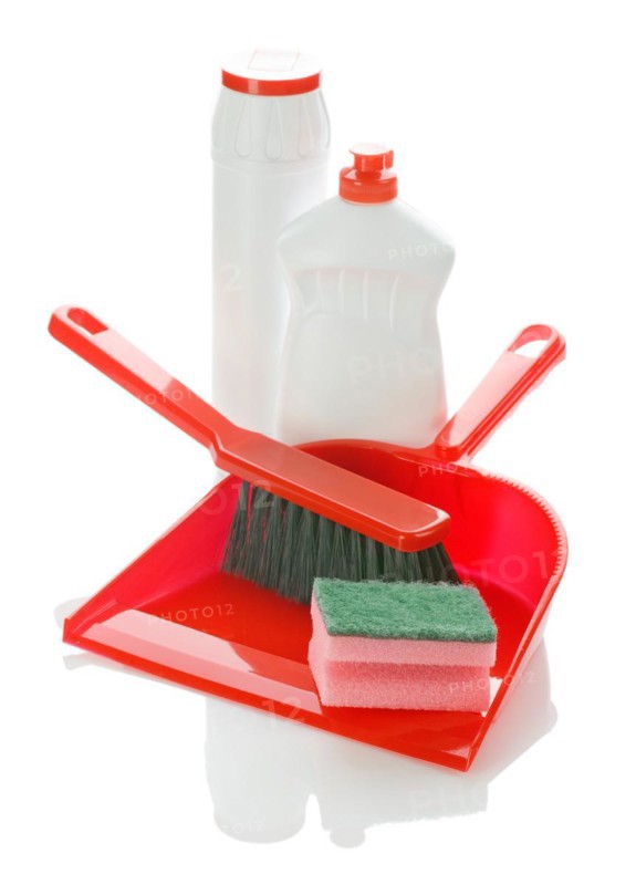 Brush on dustpan with bottles and sponge