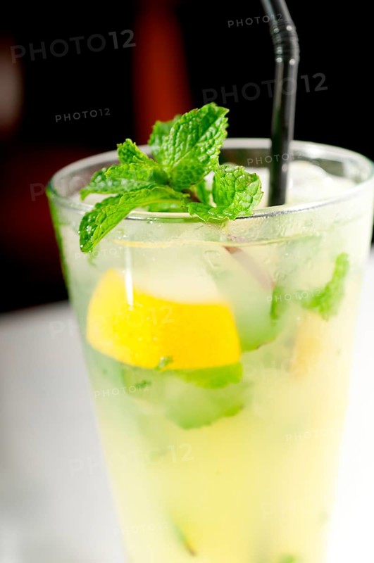 Mojito caipirina cocktail with fresh mint leaves