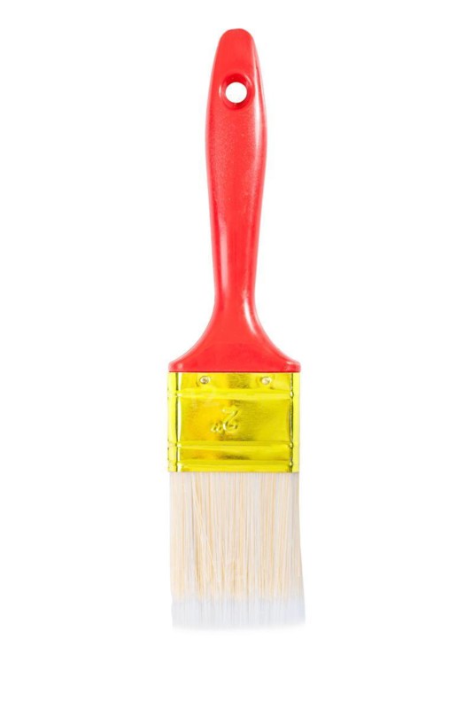 A brush with a red handle