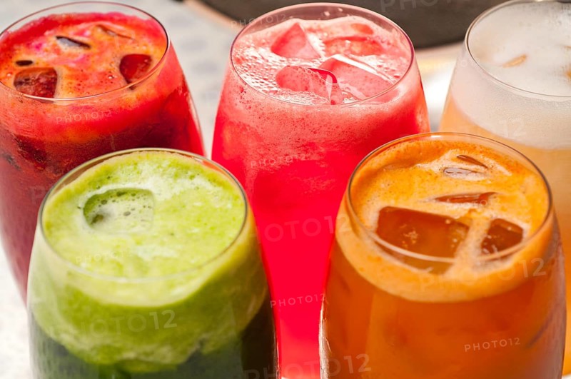 Selection of fresh fruits colorful long drink cocktails