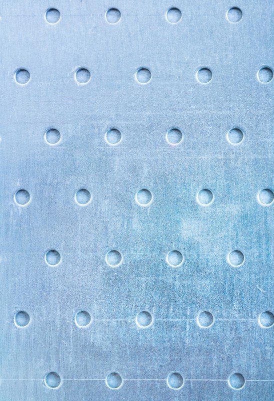 Design concept for drilled stainless steel sheets