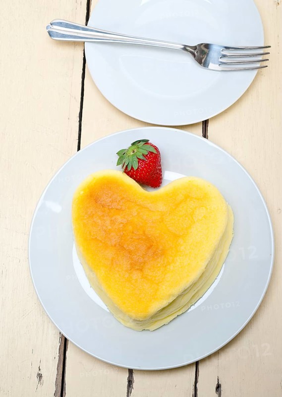 Heart shaped cheesecake with strawberryes ideal cake for valentine day