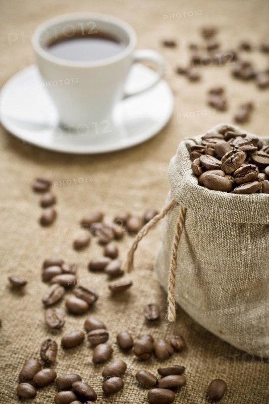 Coffee beans and cup of coffee