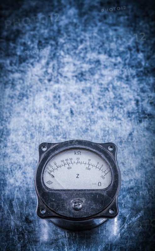 Ammeter on metallic surface electricity concept