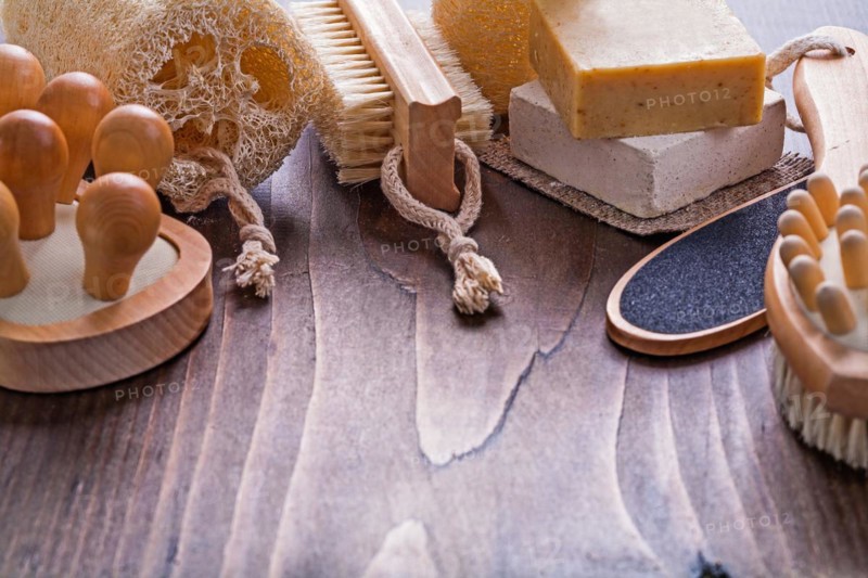 Large set of bathroom accessories on vintage wooden board with small copyspae