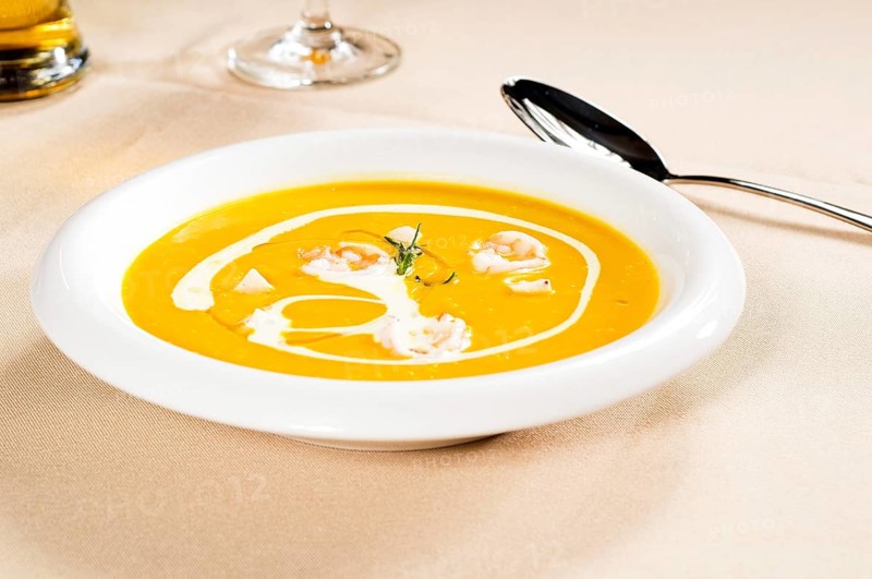 Fresh pumpkin and shrimps cream soup