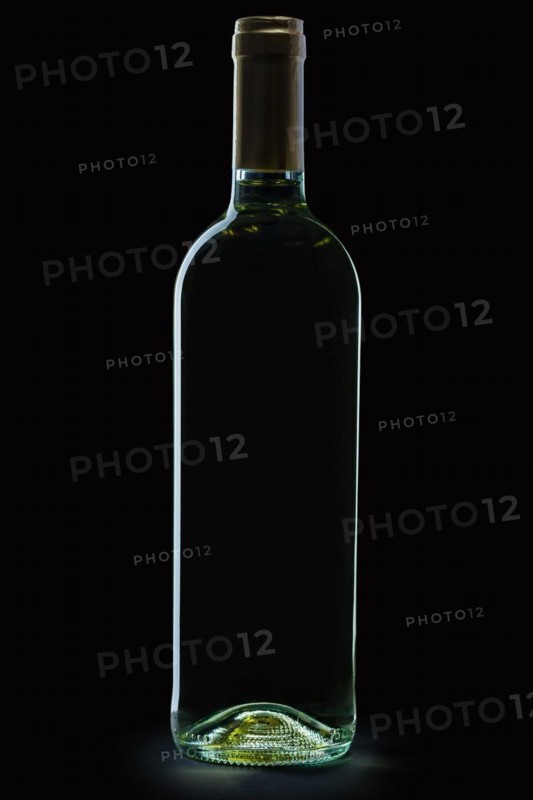 Bottle of white wine on black background