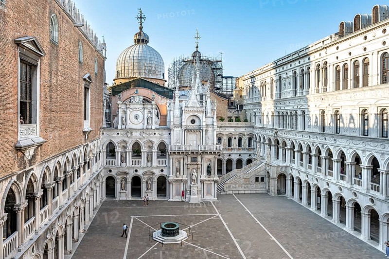 View of the inner courtyard of the Doge's Palace with St Mark's Basilica and giant staircase