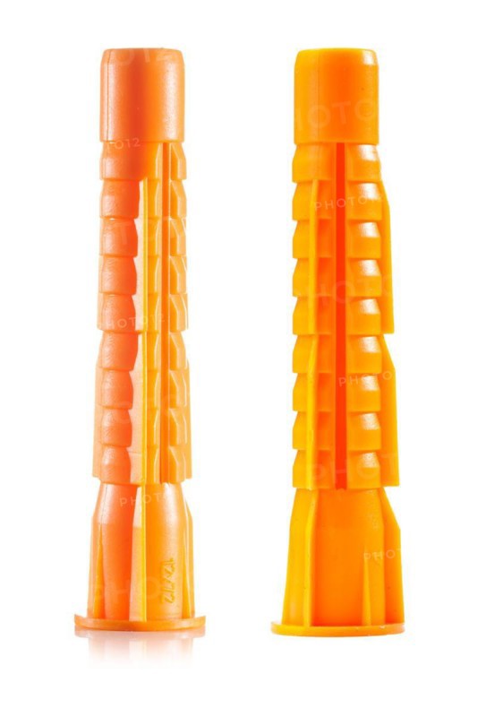New orange-coloured plastic dowels against a white background
