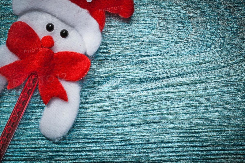 Father Christmas decoration on wooden board copy space New Year concept