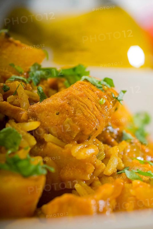 Fresh home made curry beef rice and potatoes with ingredients around composition