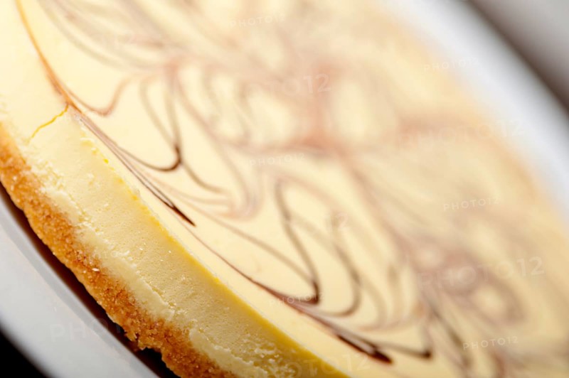 Fresh baked classic Cheese cake with chocolate topping