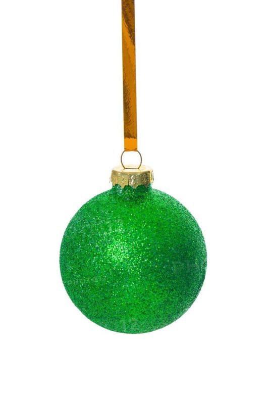 Green Christmas baubles against a white background