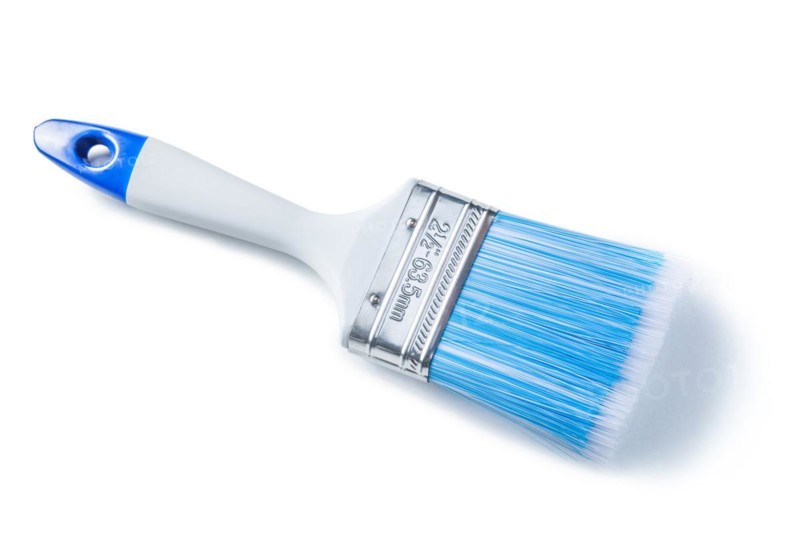 Blue paint brush with white handle isolated