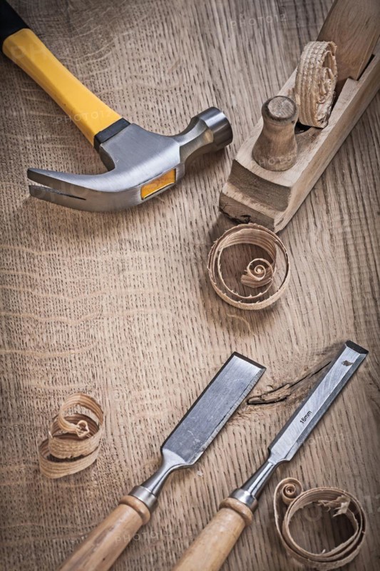 Hammer planner Chisel chips on wood
