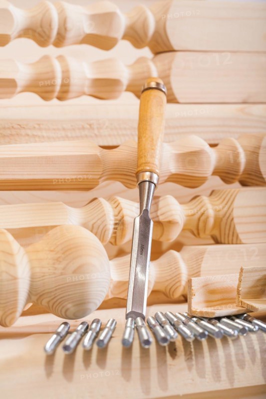 Carpenter's chisel and wooden figure