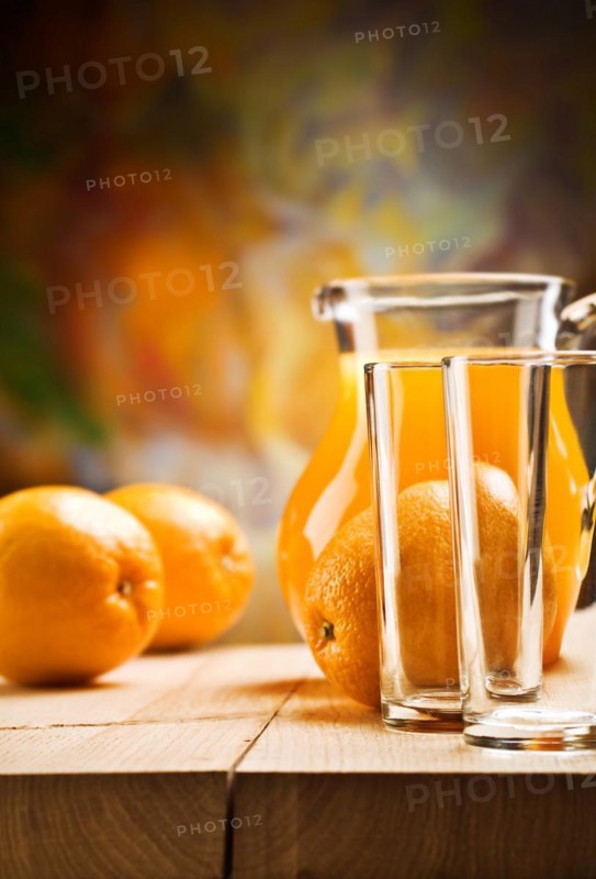Emrty glassware and oranges