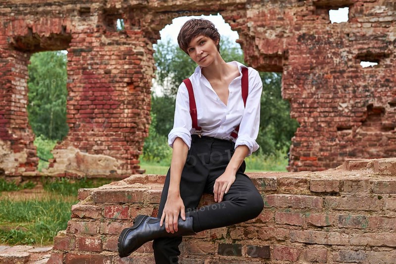 Image of a stylish beautiful woman in a white shirt
