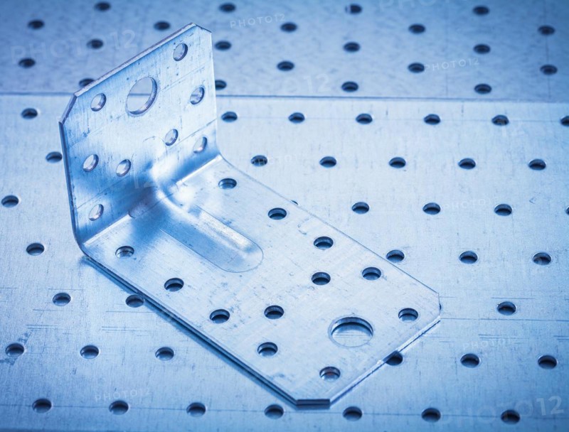 Construction concept of drilled angle irons on perforated sheet metal