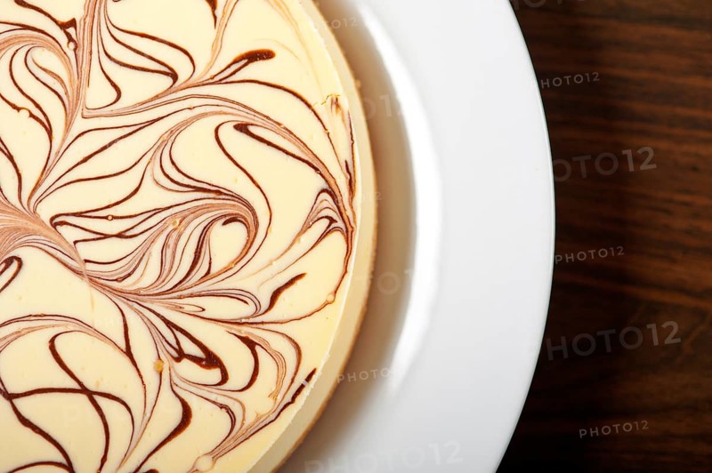 Fresh baked classic Cheese cake with chocolate topping