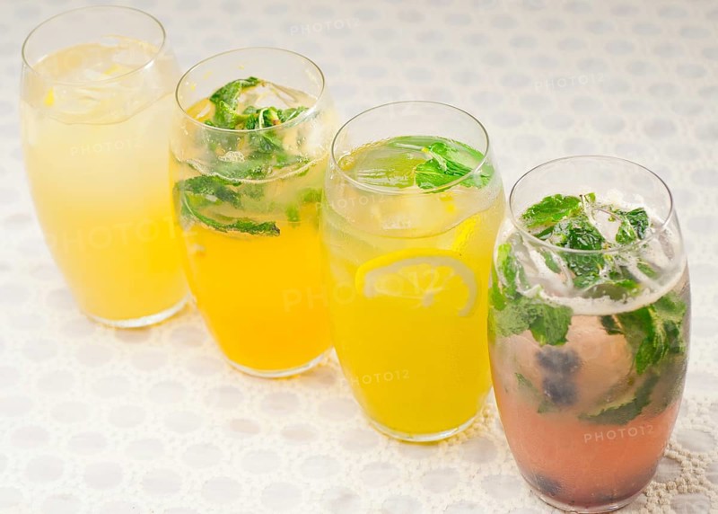 Selection of fresh fruits colorful long drink cocktails
