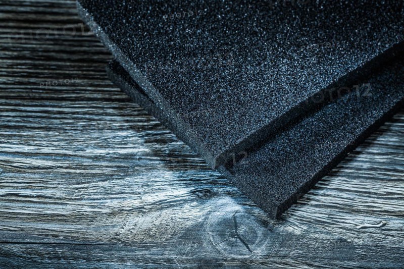 Abrasive pads on vintage wooden board