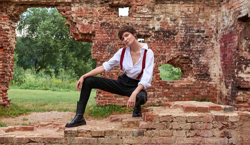 Image of a stylish beautiful woman in a white shirt
