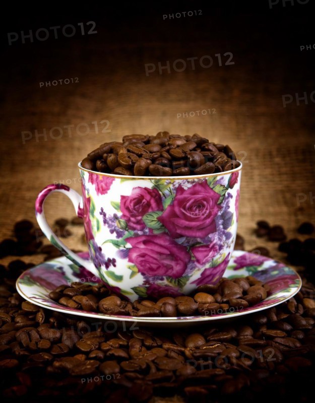 Coffee cup on a grains of coffee