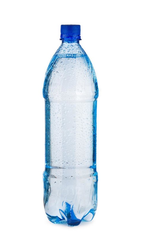 Blue bottle with water and drops isolated