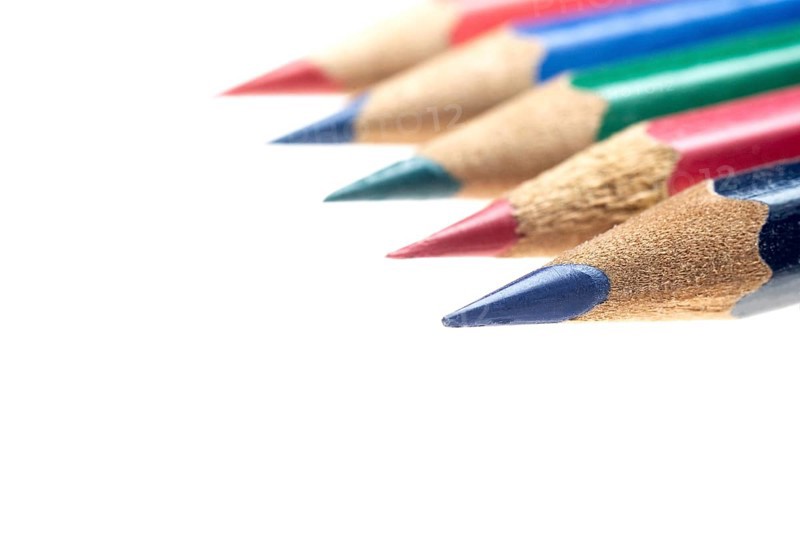 Coulor wooden sharpened pencils over white background