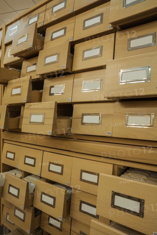 Library wooden card catalogue with opened crates
