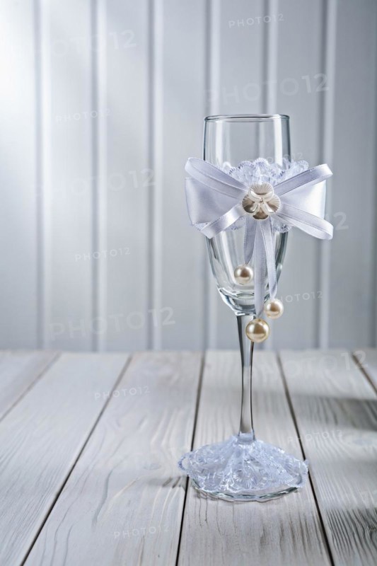 Single wine glasses wedding decorated