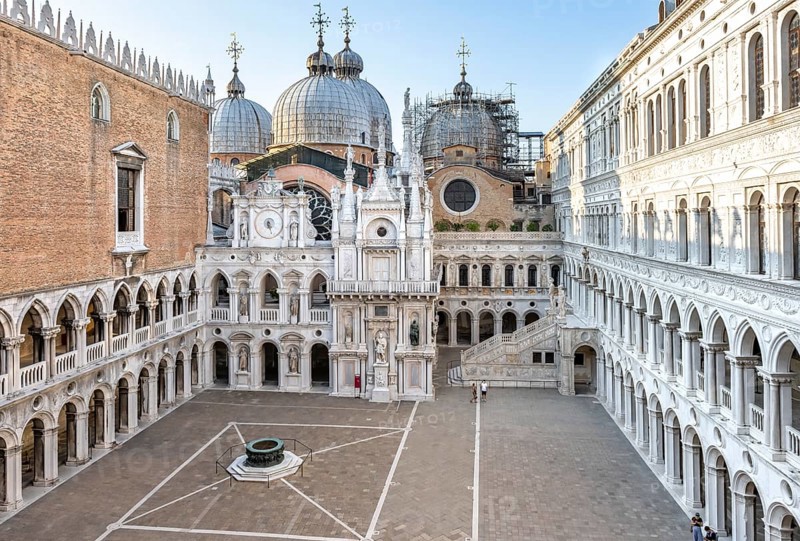 View of the inner courtyard of the Doge's Palace with St Mark's Basilica and giant staircase