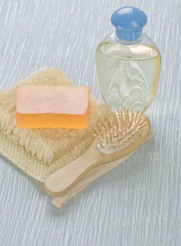 Bottle of hairbrush Soap and raffia