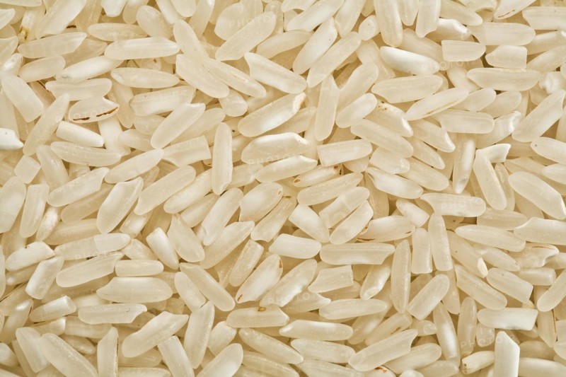 White raw rice background