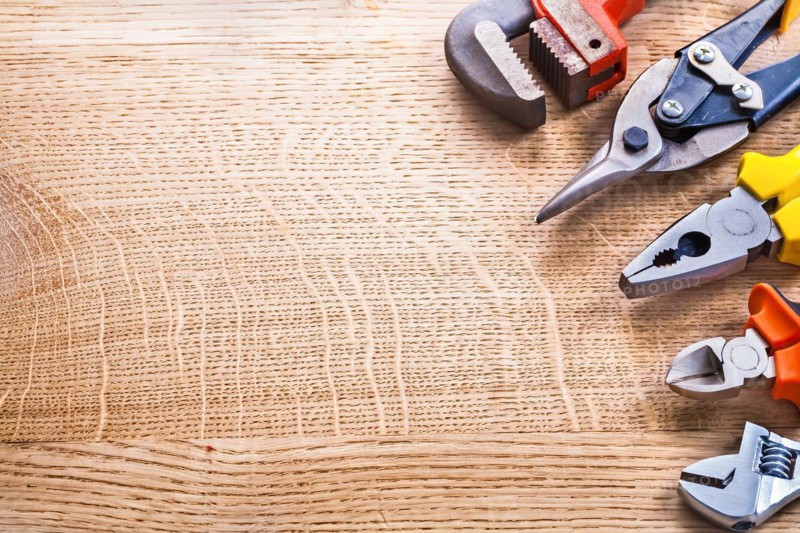 Organised copy room Wrench Pliers Pliers on wooden board