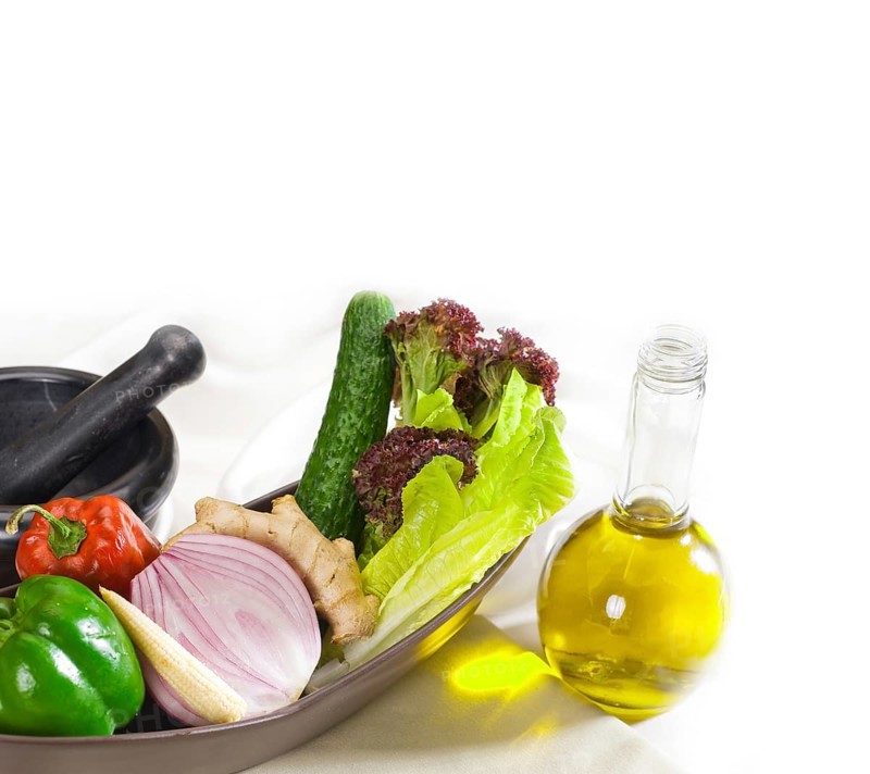 Assorted fresh vegetables and extra virgin olive oil