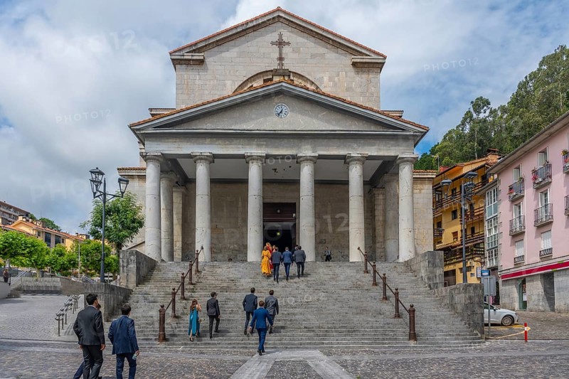 People entering the church of Our Lady of the Assumption in the coastal town of Mutriku