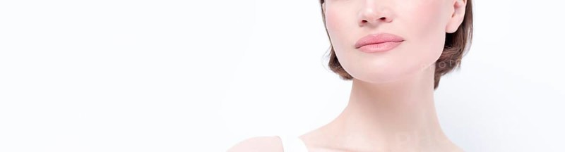 Portrait of a beautiful girl with provocative makeup. White background. Beauty concept. High quality