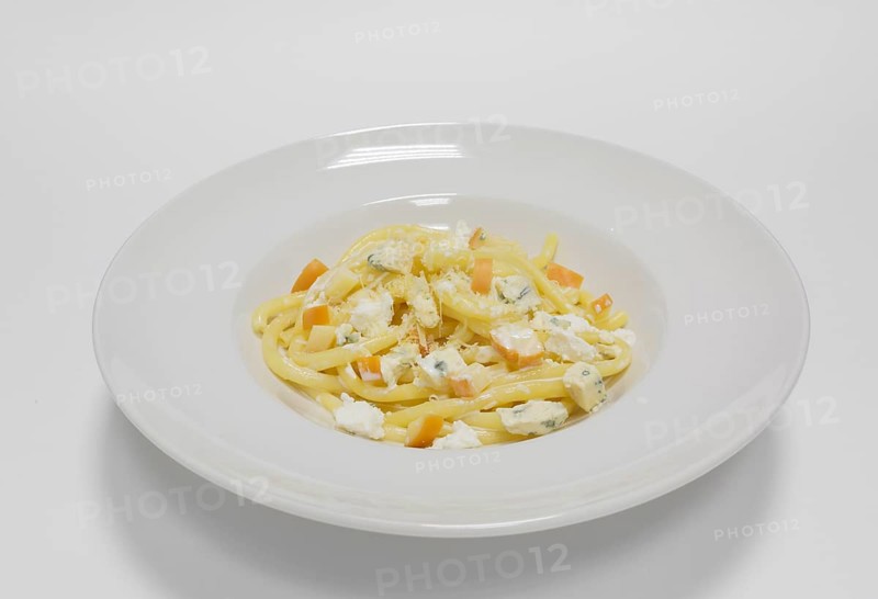 Gourmet pasta with different types of cheese. Blue cheeses. Top view.