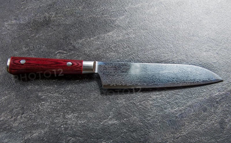 Excellent Japanese chef's knife from Damascus steel. View from above