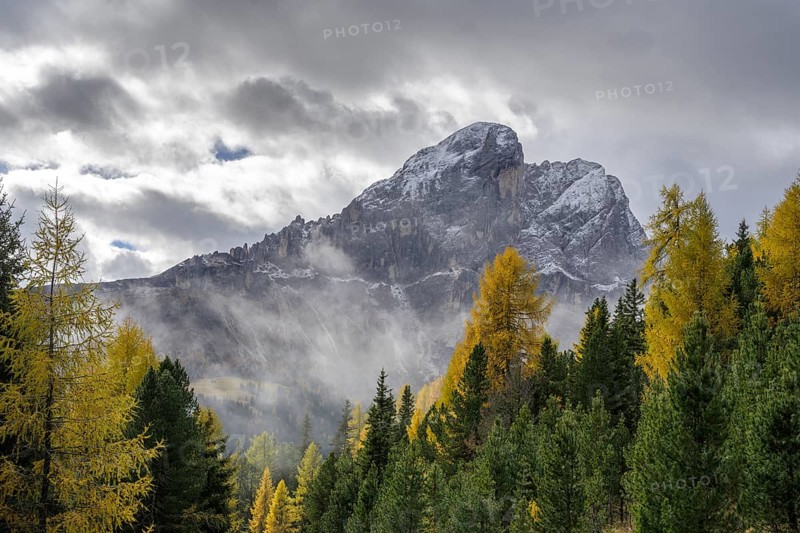 Peitlerkofel and autumnal larch forest
